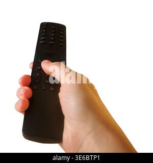 Hand mit schwarzer Fernbedienung. Mann, der den Controller verwendet, um die Kanäle zu wechseln oder die Lautstärke einzustellen. Entertainment-Gerät für Home Media System, ci Stockfoto