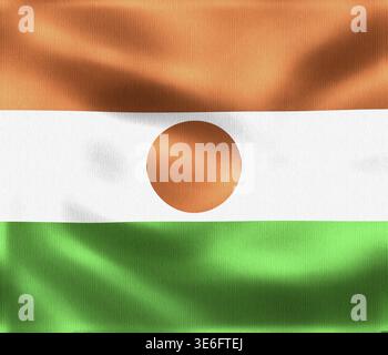 Die schwingende Flagge von Niger zeigt leuchtende Farben in Orange, weiß und Grün, mit einem orangefarbenen Kreis in der Mitte, der den Nationalstolz symbolisiert Stockfoto