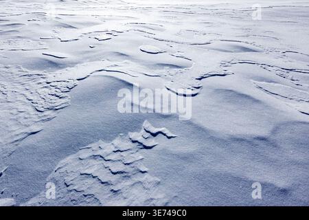 Nahaufnahme der texturierten Schneeoberfläche Stockfoto