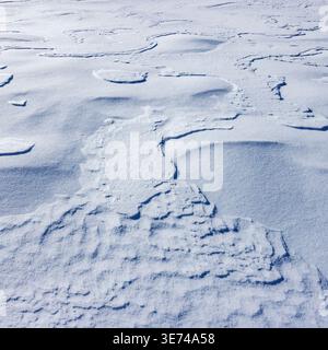 Nahaufnahme der texturierten Schneeoberfläche Stockfoto