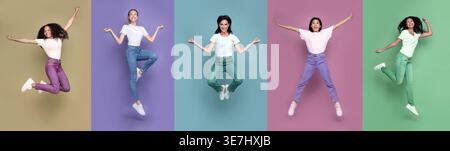 Verschiedene Frauengruppen, die weiße Hemden und bunte Jeans tragen, springen in verschiedenen Posen vor farbenfrohen Hintergrund im Studio Stockfoto