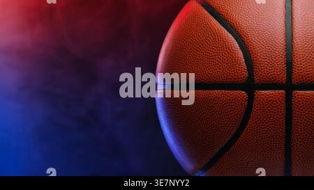 Basketballball beleuchtet von leuchtenden roten und blauen Rauchstrahlen auf dunklem Hintergrund Stockfoto