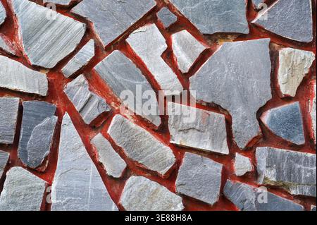 Textur einer Steinwand. Teil einer Steinwand, für Hintergrund oder Textur Stockfoto