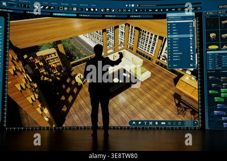Erstellung von Grundrissen, CAD-Programmen und Freiberuflern mit Virtual Reality für Immobilienprojekte. Interagieren mit 3D-Gebäudevisualisierung, VR-Ausrüstung und Architekturdesigner mithilfe von Videowall Stockfoto