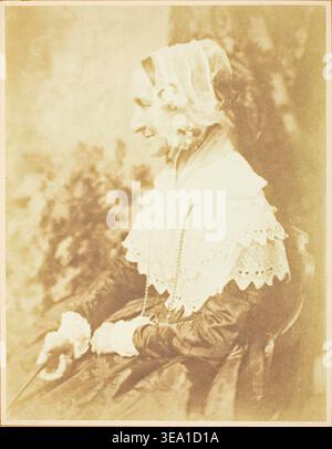 Porträt von Mrs. Rigby von David Octavius Hill und Robert Adamson, 1844, eine sitzende Frau in formellem Kleid mit weißem Spitzenkragen und Mütze, die in besinnlicher Pose nach unten blickt Stockfoto