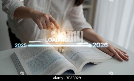 Visualisierung der Verschiebung von 2025 auf 2026. Fortschrittsbalken symbolisiert Fortschritt, strategische Vorausschau, jährliche Zielsetzung und Unternehmenstransformation Stockfoto