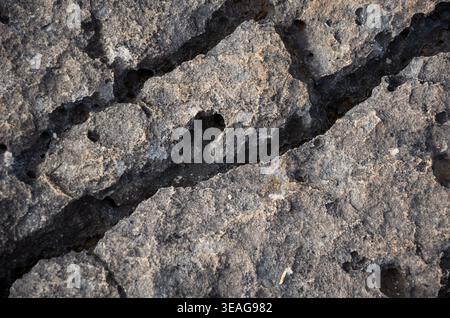 Nahaufnahme der rauen strukturierten Felsoberfläche Stockfoto