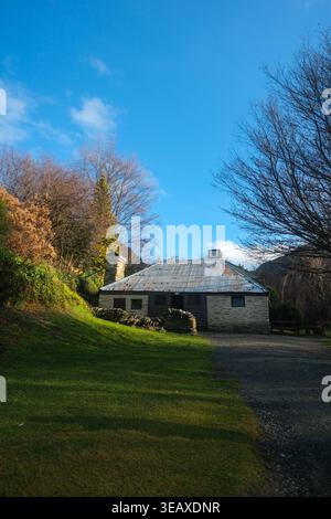 Alte chinesische Siedlungshäuser in Arrowtown, Neuseeland, rustikale Hütten, die aus der Zeit des Goldbergbaus der 1800er Jahre erhalten wurden. Stockfoto