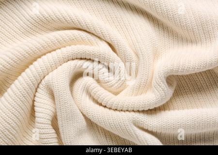 Textur aus zerknittert gestricktem Stoff als Hintergrund Stockfoto