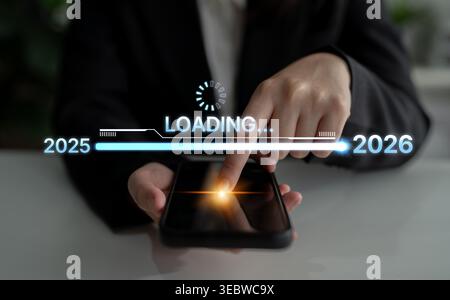 Visualisierung der Verschiebung von 2025 auf 2026. Fortschrittsbalken symbolisiert Fortschritt, strategische Vorausschau, jährliche Zielsetzung und Unternehmenstransformation Stockfoto
