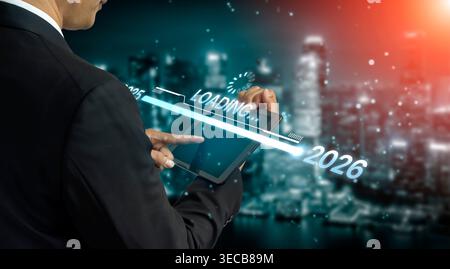 Visualisierung der Verschiebung von 2025 auf 2026. Fortschrittsbalken symbolisiert Fortschritt, strategische Vorausschau, jährliche Zielsetzung und Unternehmenstransformation f Stockfoto