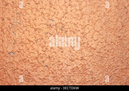Rustikale verwitterte alte Betonwand mit Farbstreifen Makro Stockfoto