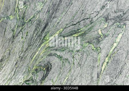 Natürliche Marmoroberfläche grau Grünton organische Schicht Mineralmuster abstrakte Hintergrunddetails robuste Struktur. Strukturierte Steinplatte elegant Stockfoto