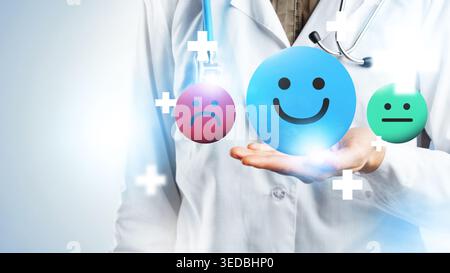 Der Arzt hält Symbole der Emotionen während der Therapiesitzung mit Patienten in der Hand Stockfoto