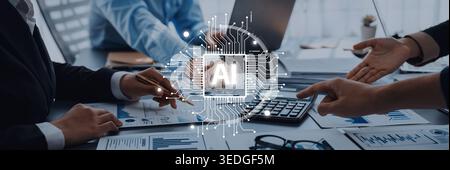 Eine Gruppe von Fachleuten, die eine Strategie für künstliche Intelligenz diskutieren und sich auf Datenanalyse und Technologielösungen in einem modernen Büroumfeld konzentrieren Stockfoto