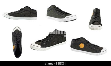Legere Sneakers aus Canvas auf weißem Hintergrund. Schuhsatz aus verschiedenen Winkeln dargestellt, einschließlich Seiten-, Front- und perspektivischer Ansicht. Komfortabel Stockfoto