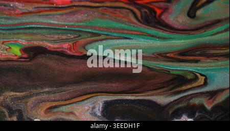 Glänzende Mischung. Emulsionstropf. Schimmernde, unscharfe Marmor-Farbmischung. Brauner, roter, grüner Stream-Pigmenttinte abstrakter Hintergrund. Stockfoto