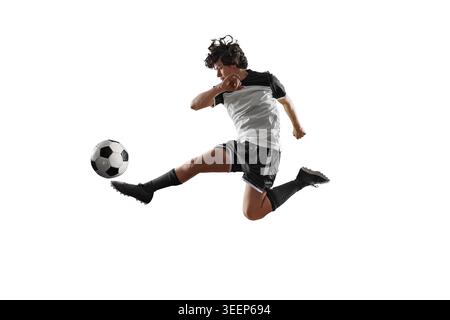 Fußballspieler in Aktion, isoliert auf freiem weißem Hintergrund Stockfoto