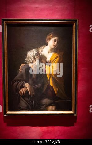 Florenz, Italien - 17. September 24: Gerahmtes Gemälde, das einen sitzenden älteren Mann und eine stehende Frau in einer intimen Szene zeigt, ausgestellt in den Uffizien in Florida Stockfoto