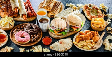 Lebensmittel, die das Krebsrisiko erhöhen. Junk Food. Stockfoto