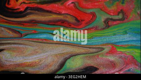 Farbenfrohe Farbflüssigkeit. Flimmerndes Verschütten. Rot-grünes, blaues Marmor, flüssige Unschärfe-Mischung. Helles Kunstwerk nasse Textur abstrakter Hintergrund. Stockfoto