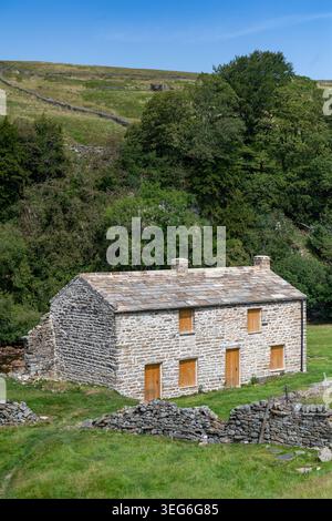 Alte Bergarbeiterhütten in Swaledale wurden im Rahmen eines Regierungsprogramms renoviert. Yorkshire Dales National Park, Großbritannien. Stockfoto