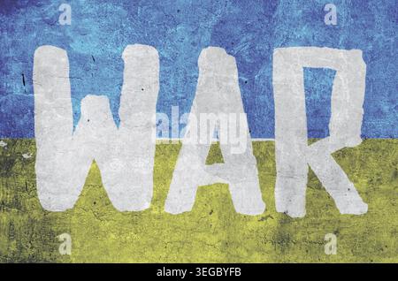 Inschrift an der Kriegswand in den Farben des ukrainischen Flaggenhintergrunds blau und gelb Stockfoto