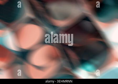 Ein lebendiges und vielfarbiges abstraktes Bild zeigt weiche, verschwommene geometrische Formen. Die dynamische Mischung aus Farben und Formen sorgt für ein beeindruckendes visuelles ef Stockfoto