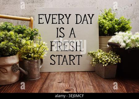 Jeder Tag ist ein Neuanfang Motivations- und inspirierende Zitate Stockfoto