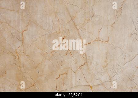 Polierte, beige Marmorplatte mit brauner Struktur Stockfoto