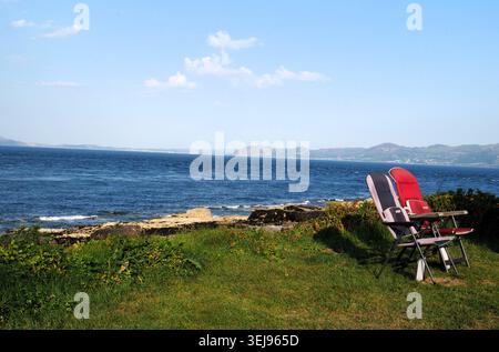 Trwyn du Lighthouse: Tagesausflug am Strand Stockfoto
