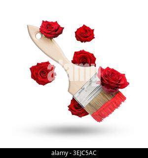 Pinsel und rote Rosen in der Luft vor weißem Hintergrund Stockfoto