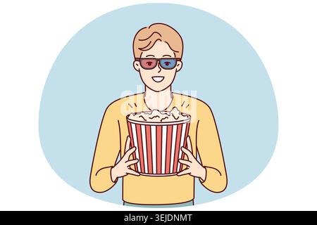 Glücklicher Mann mit Popcorn im Kino Stockfoto