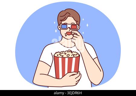 Ein Mann in 3D Gläsern isst Popcorn Stockfoto