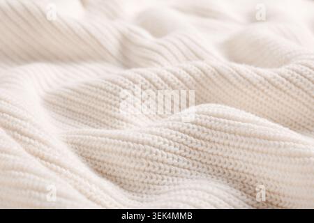 Textur aus zerknittert gestricktem Stoff als Hintergrund Stockfoto