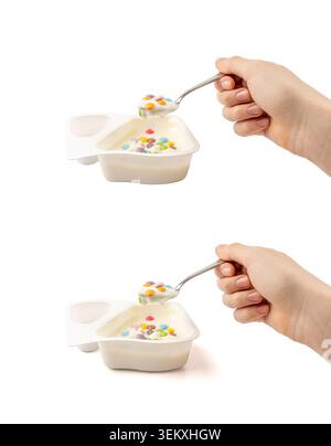 Joghurtbecher isoliert, Joghurt mit bunten Dragees im Plastiktopf, Löffel in der Hand, Milchpuddingbehälter, glasierte Schokoladenknöpfe, Milchkost klein p Stockfoto