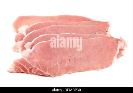 Rohe, dünne Schweinelendsteaks auf weißem Hintergrund. Stockfoto