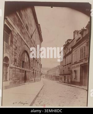 Sainte-Pélagie steht 1898 in der Rue du Puits-de-l'Ermite in Paris, im Hintergrund ist das Krankenhaus Pitié zu sehen. Das Schwarzweißfoto von Atget zeichnet das Gelände vor dem Abriss im Mai 1899 auf und weist auf seine Evakuierung im August 1898 hin. Stockfoto