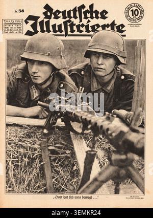 1942 Deutsche Illustrierte deutsche Soldaten mit Maschinengewehr Stockfoto