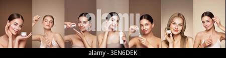 Schönheitsfrauen zeigten, wie sie verschiedene Hautpflegeprodukte auf ihre Gesichter auftrugen, während sie in die Kamera lächelten. Die Frauen stehen vor einem neutralen Hintergrund. Be Stockfoto
