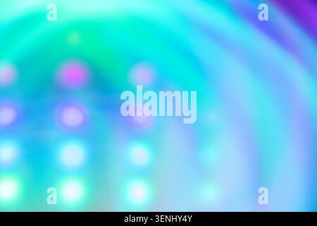 Abstraktes Bild mit bunten Lichtmustern mit verschwommenen Kreisen und Verläufen in Blau, Grün und Lila, geeignet für Hintergründe und Design ap Stockfoto