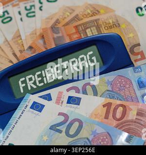 Taschenrechner mit dem Wort „Zulage“ auf dem Display Stockfoto
