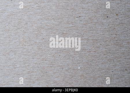 Weiches braunes Papier zeigt eine sanfte Textur, die Kreativität und Ruhe anregt. Stockfoto