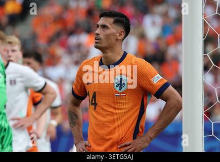 Berlin, Deutschland - 25. Juni 2024: Porträt von Tijjani Reijnders aus den Niederlanden (#14) während des Gruppenspiels der UEFA EURO 2024 Niederlande gegen Österreich im Olympiastadion in Berlin Stockfoto