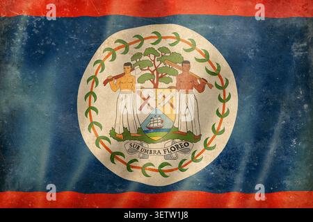 Alte belizische Flagge, abgenutzt, fleckig und zerknittert. Strukturierter canva-Hintergrund Stockfoto