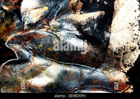 Glänzende abstrakte Metallic-Goldbronze und Silberfarbe auf schwarzem Hintergrund Stockfoto