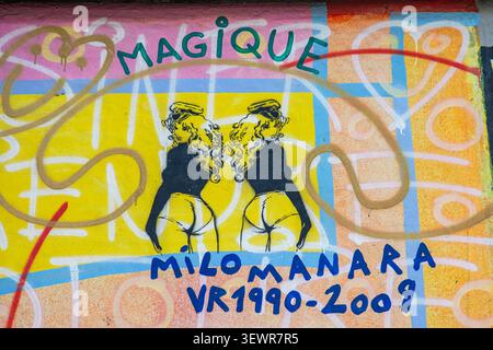 Detail von Paix, Amour-Sagesse Wandgemälde von Hervé Morlay (alias VR) und Andreas Paulun auf erhaltener Berliner Mauer in der East Side Gallery Stockfoto