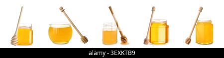 Verschiedene Gläser Honig mit hölzernen Honiglöffeln Stockfoto