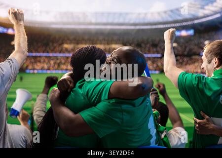 Fußballfans, die sich auf den Stadiontribünen umarmen, begeistert von einem Tor in letzter Minute. Emotionale afroamerikanische Fußballfans umarmen sich nach dem Sieg der Lieblingsmannschaft Stockfoto