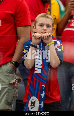 Inglewood, California, USA. 2nd July, 2026. A young Austria soccer fan watches his team lose to Spain at the Los Angeles Stadium. (Credit Image: © Mark Edward Harris/ZUMA Press Wire) EDITORIAL USAGE ONLY! Not for Commercial USAGE! Stockfoto